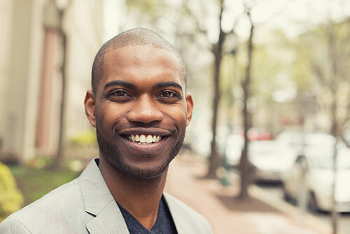 man smiling looking directly into camera