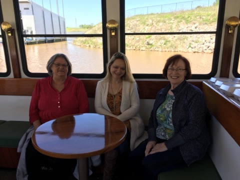 members enjoy a riverboat cruise