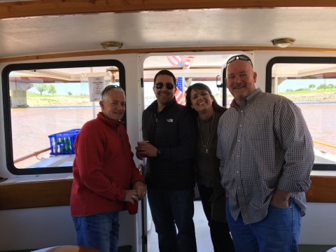 members enjoy a riverboat cruise